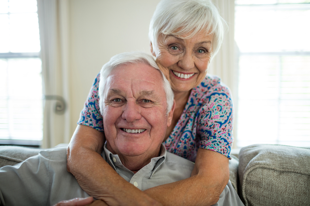 Smiling senior couple at home