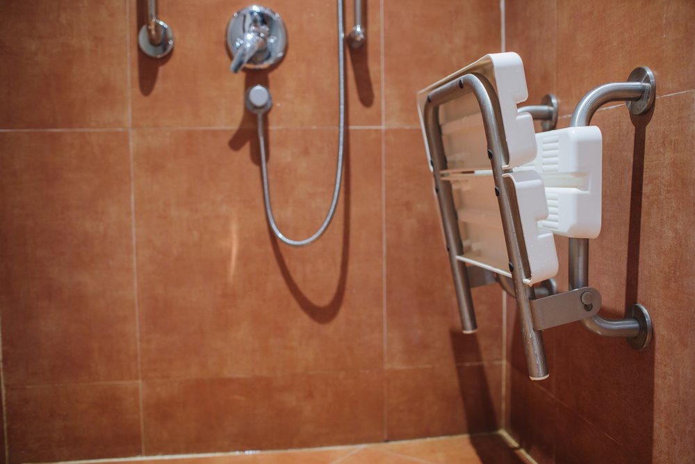 Shower seat with safety bars for accessibility